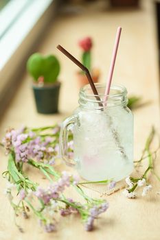Italian soda on wood bar in cafe