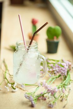 Italian soda on wood bar in cafe