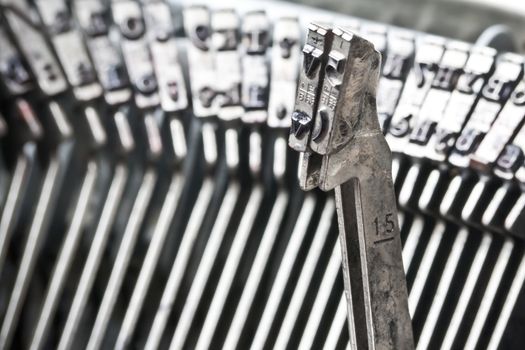 closeup of two type bars of typewriter