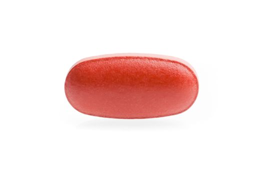 one red medical pill isolated on white background