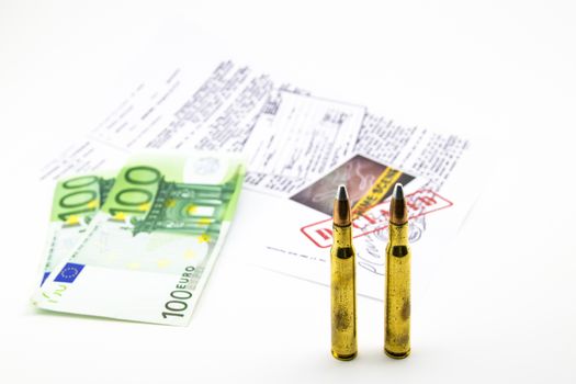 composition with bullets, money and documents of the investigation