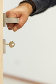 Door with an hand on the handle