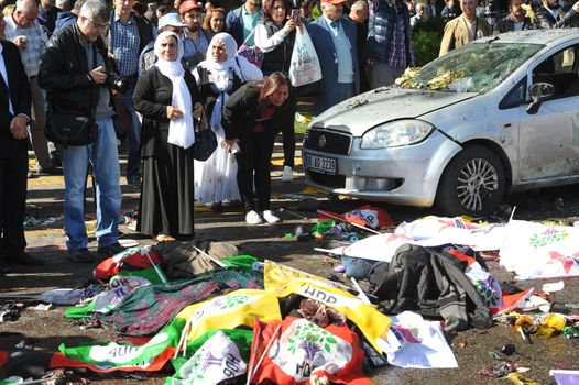 TURKEY, Ankara: Dead bodies lie on the ground after two explosions in the Turkish capital of Ankara killed nearly 100 people on October 10, 2015.The bombs went off near the main train station in the city. According to officials the bombs went off at a peace rally killing 97 and injuring 400 more.The rally was being held to call for an end to the conflict between the Turkish Government and the Kurdish PKK. As many as 14,000 people were at the rally when two suicide bombers detonated themselves in the crowd. No group has claimed responsibility yet for the attack. The death toll is expected to climb.