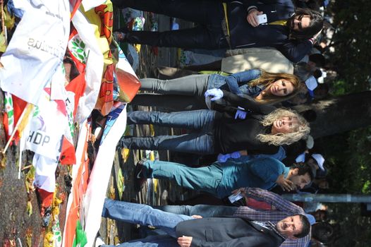TURKEY, Ankara: Distraught bystanders look over bodies after two explosions in the Turkish capital of Ankara killed nearly 100 people on October 10, 2015.The bombs went off near the main train station in the city. According to officials the bombs went off at a peace rally killing 97 and injuring 400 more.The rally was being held to call for an end to the conflict between the Turkish Government and the Kurdish PKK. As many as 14,000 people were at the rally when two suicide bombers detonated themselves in the crowd. No group has claimed responsibility yet for the attack. The death toll is expected to climb. 