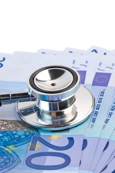 detail of stethoscope on 20-euro banknotes on white background