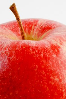 detail of red apple on white background