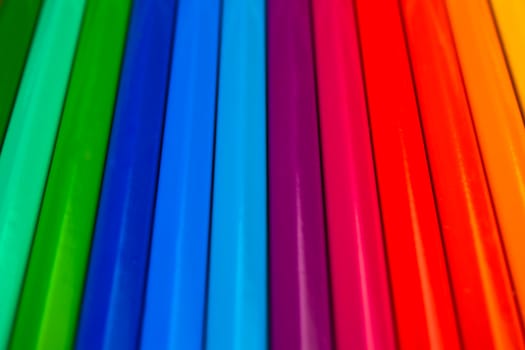 background of rainbow of colorful pencils