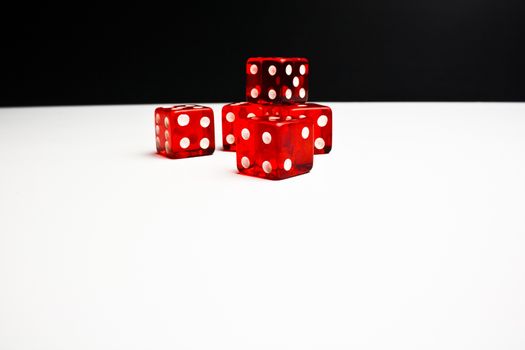 Close Up of  red dice on black and  white background