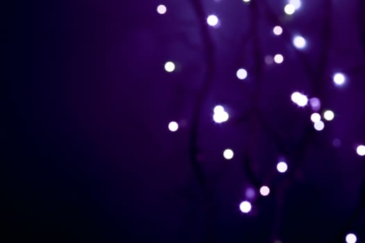 white defocused lights on abstract  violet background