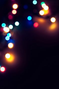 christmas lights defocused on black background