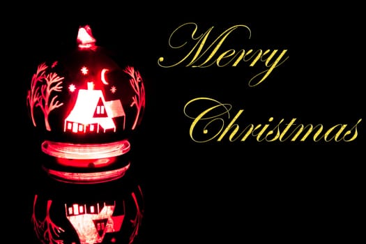 detail of  brighter christmas decoration on black background with space for text