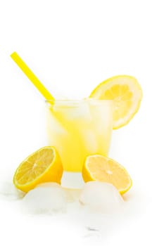 detail of an lemon with a straw, ice and glass