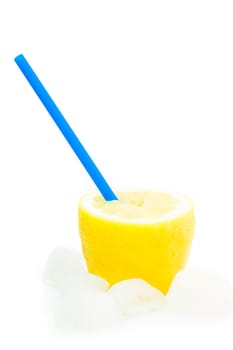 detail of an lemon with a straw and ice 