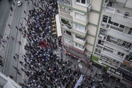 TURKEY, Izmir: Labor organizations and civil society organizations gathered in Izmir, Turkey on October 10, 2015 after explosions killed nearly 100 people in Ankara earlier in the day.Two bombs went off near the main train station in the city. According to officials the bombs went off at a peace rally killing 97 and injuring 400 more.These images show people at the rally demanding justice. Several people at the rally were taken into custody after clashing with police.
