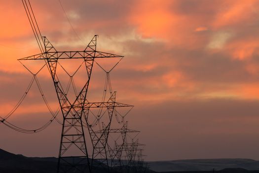 Power transmission lines against the sky