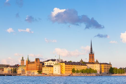 Panoramic view of swedish capital Stockholm in sunset. Gamla stan, old medieval downtown. Horisontal composition. Copy space.