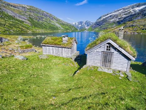 Traditional norwegian huts with grass roof in Gaularfjellet mountain pass in Norway