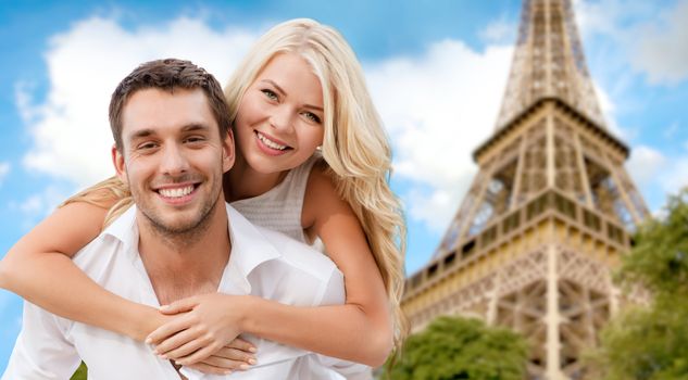 summer holidays, vacation, dating and travel concept - happy couple having fun over eiffel tower background