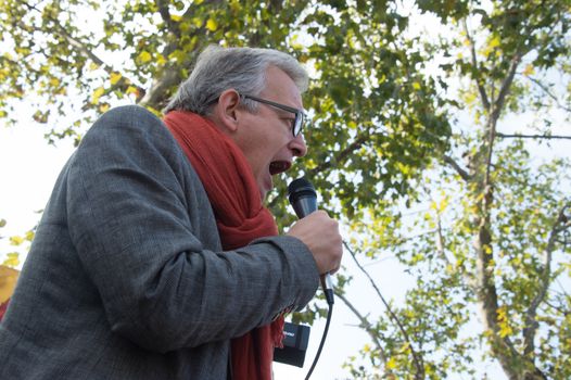 FRANCE, Paris : National head of Communist party Pierre Laurent makes a speech while protesters gather in Place de la R�publique in Paris on October 11, 2015, for the second time after the terror attack in Ankara, in tribute to the victims of the twin explosion in Turkish capital city. On October 11, 2015, at least 95 people died after a twin explosion in the center of the capital city in Turkey. The Turkish government declared three days of mourning and said that it won't delay legislative elections expected for November 1st, 2015. 