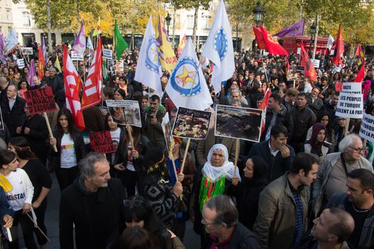 FRANCE, Paris : Hundreds of protesters gather in Place de la R�publique in Paris on October 11, 2015, for the second time after the terror attack in Ankara, in tribute to the victims of the twin explosion in Turkish capital city. On October 11, 2015, at least 95 people died after a twin explosion in the center of the capital city in Turkey. The Turkish government declared three days of mourning and said that it won't delay legislative elections expected for November 1st, 2015. 