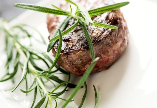 Grilled bbq steak with rosemary