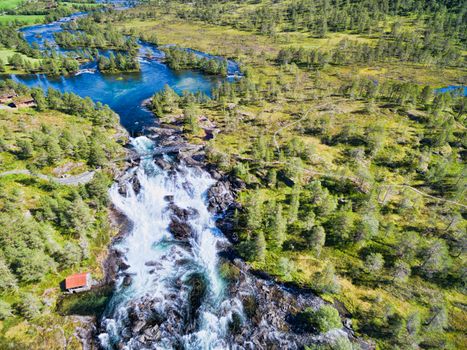 Popular norwegian waterfalls Likholefossen from air