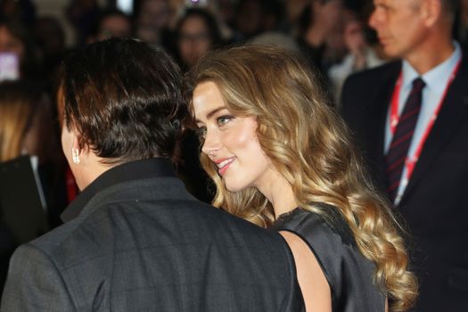 UNITED KINGDOM, London: Johnny Depp and Amber Heard attend the BFI London Film Festival screening of Black Mass at Odeon Leicester Square in London on October 11, 2015. 