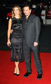 UNITED KINGDOM, London: Johnny Depp and Amber Heard attend the BFI London Film Festival screening of Black Mass at Odeon Leicester Square in London on October 11, 2015. 