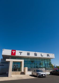 BUENA PARK, CA/USA - OCTOBER 10, 2015: Tesla Motors automobile dealership. Tesla Motors, Inc. is an American automotive and energy storage company.