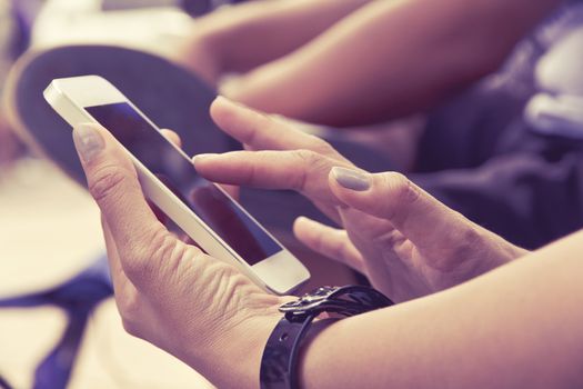 Close up image of Teenage girl text messaging on her phone
