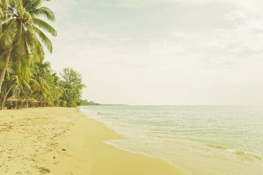 retro vintage style photo of empty beach