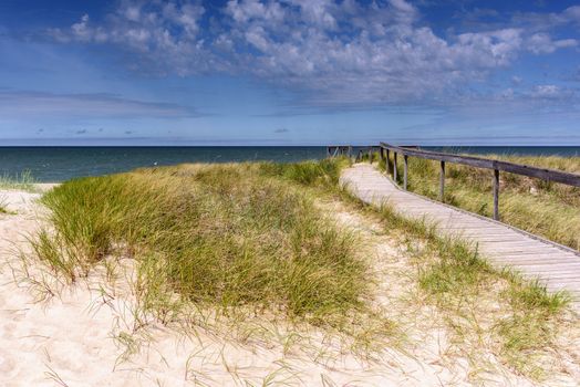 Wooden pier on the empty beach