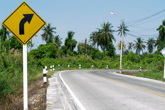 Road signs andbend in thailand
