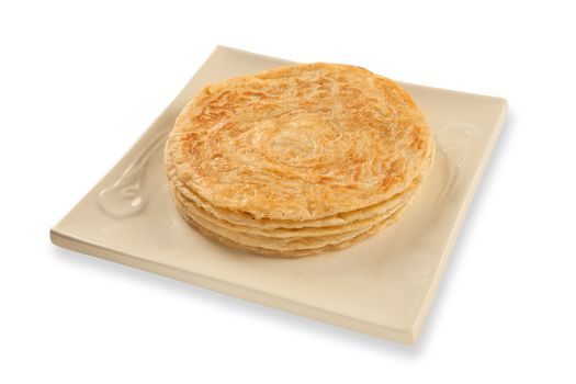 Puri paratha stack on plate isolated on a white background