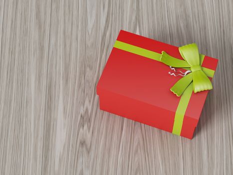 red gift box with green ribbon bow, on wooden background