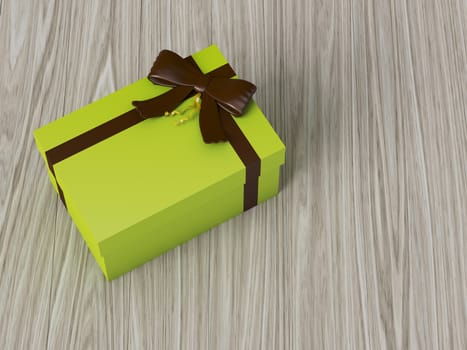 green gift box with brown ribbon bow, on wooden background