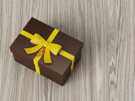 dark brown gift box with yellow ribbon bow, on wooden background