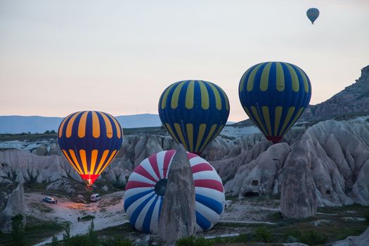 hot air balloon ready for take off from ground