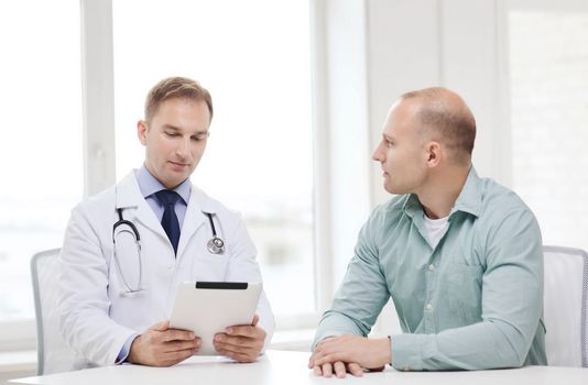 healthcare, technology and medicine concept - serious doctor with tablet pc computer and patient in hospital