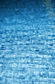 Texture of blue water. Vertical photo