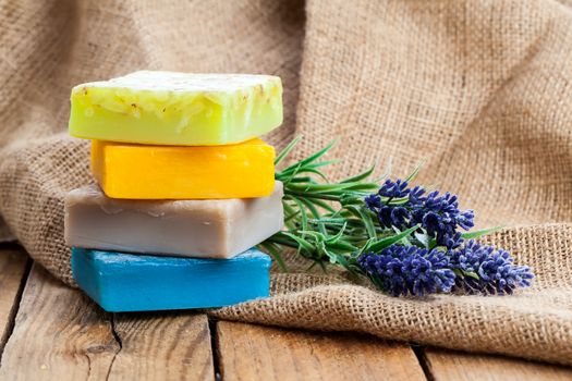 lavender handmade soap bars, on wooden background