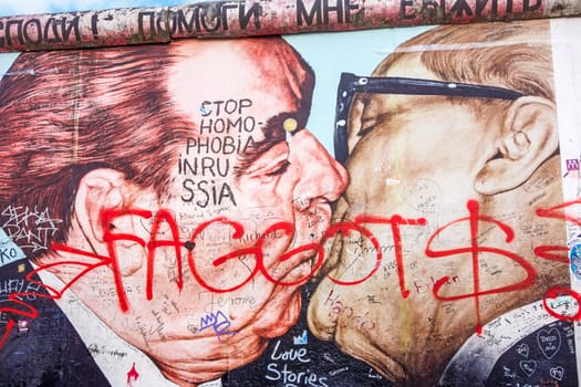 Berlin, Germany - October 26, 2013: East Side Gallery - an international memorial for freedom. Former Berlin Wall - a barrier within Germany, dividing the country.