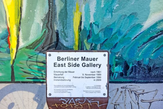Berlin, Germany - October 26, 2013: East Side Gallery - an international memorial for freedom. Former Berlin Wall - a barrier within Germany, dividing the country.