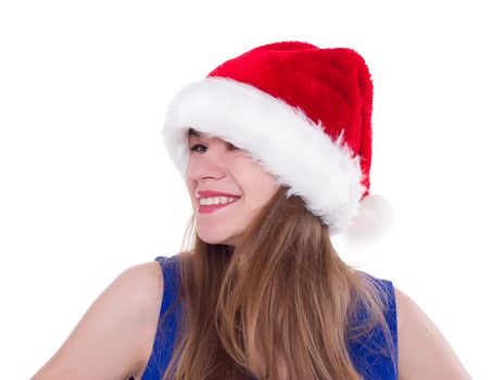 Portrait of joyful pretty woman in red santa claus hat laughing isolated on white background. Beautiful girl looking happy and excited. Happy Christmas and New Year holidays full of fun.