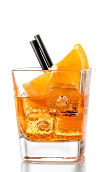 glass of spritz aperitif aperol cocktail with orange slices and ice cubes isolated on white background