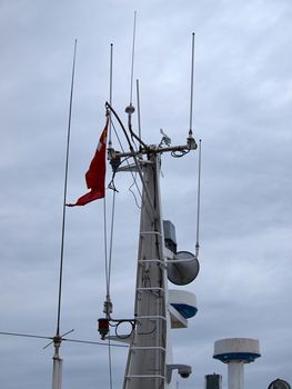 Close details of radar  navigation system and communication tower on a fancy motor yacht            