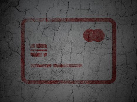 Money concept: Red Credit Card on grunge textured concrete wall background