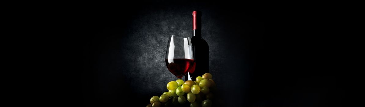 Composition with wine on the black background