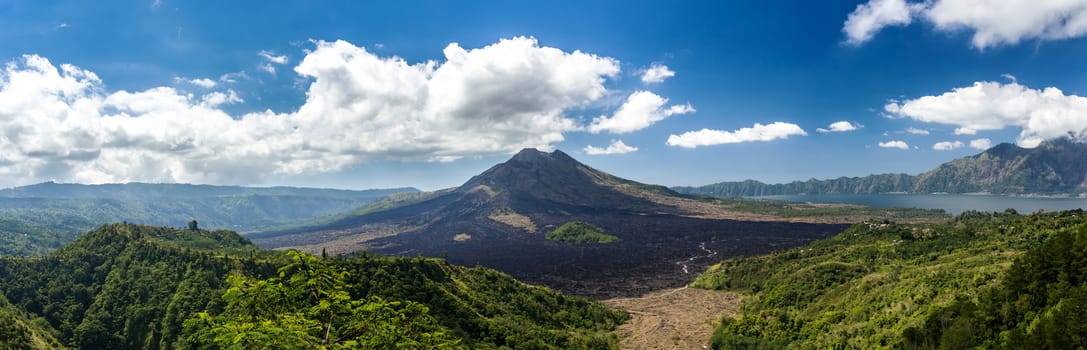 Batur volcano and Agung mountain panoramic view with blue sky from Kintamani, Bali, Indonesia