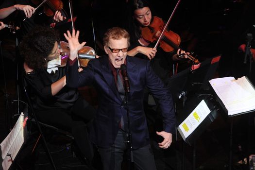 FRANCE, Paris: American composer Danny Elfman and the Lamoureux orchestra perform on the stage of the Grand Rex, in Paris, during the show Danny Elfman's music from the films of Tim Burton, on October 10, 2015.